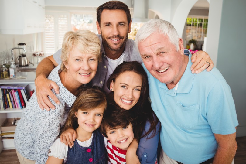 portrait-smiling-family-with-grandparents